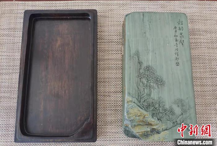 圖為盧保勝為提升洮硯文化內(nèi)涵，制作“一硯一銘、一盒一拓”成品展示?！堟?攝